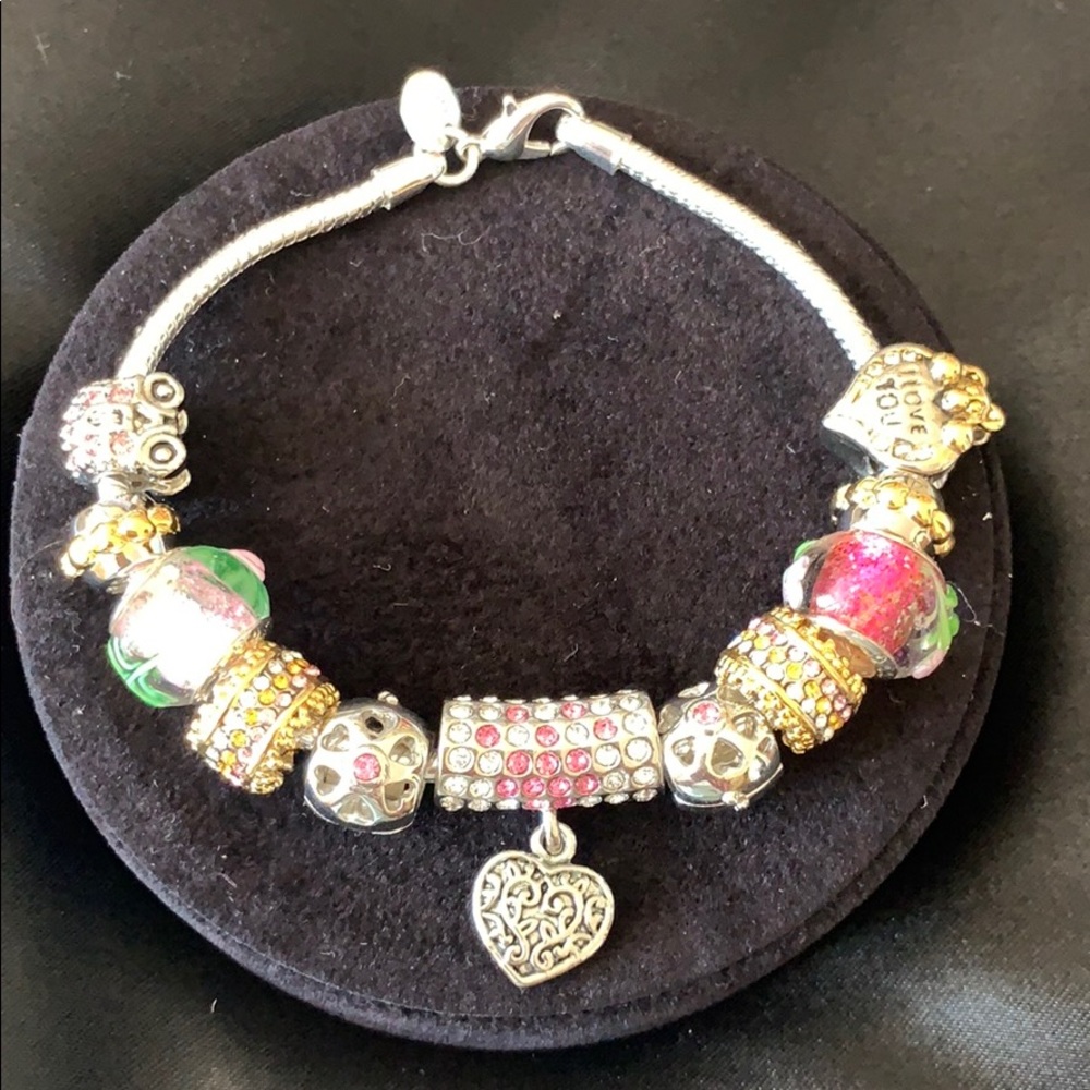 NWOT! 925 sterling silver bracelet with charms